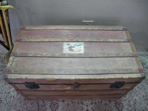 A fabulous large vintage travel trunk perfect for extra storage/ fashionable rustic coffee table!!