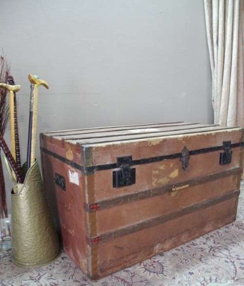 A fabulous large vintage travel trunk perfect for extra storage/ fashionable rustic coffee table!!