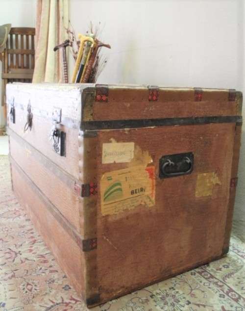 A fabulous large vintage travel trunk perfect for extra storage/ fashionable rustic coffee table!!