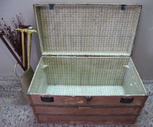 A fabulous large vintage travel trunk perfect for extra storage/ fashionable rustic coffee table!!