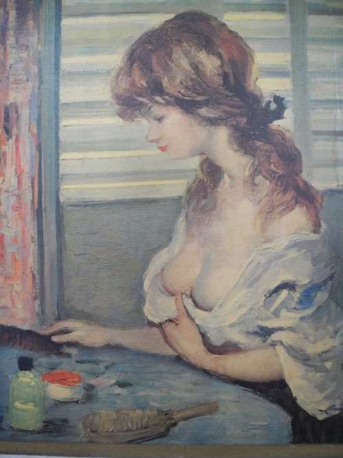 A very pretty oil on board painting of young lady at a dresser, gorgeous in any room!