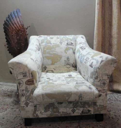 Two stylish & modern arm chairs w/ thick durable fabric w/ a nautical theme.Stunning in all rooms.