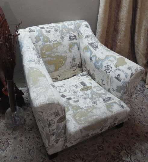 Two stylish & modern arm chairs w/ thick durable fabric w/ a nautical theme.Stunning in all rooms.