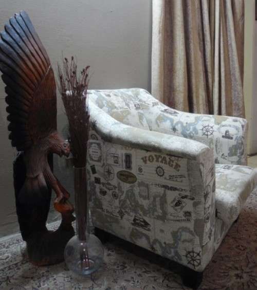 Two stylish & modern arm chairs w/ thick durable fabric w/ a nautical theme.Stunning in all rooms.