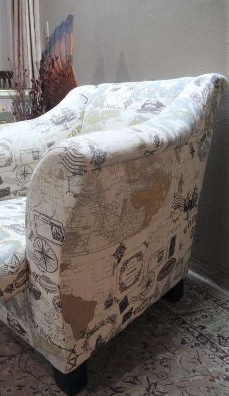 Two stylish & modern arm chairs w/ thick durable fabric w/ a nautical theme.Stunning in all rooms.