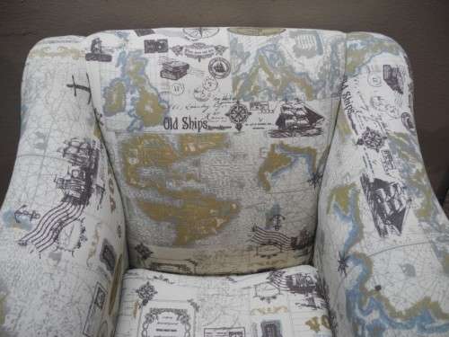 Two stylish & modern arm chairs w/ thick durable fabric w/ a nautical theme.Stunning in all rooms.