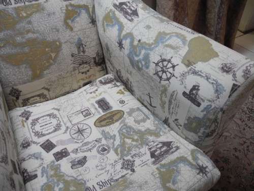 Two stylish & modern arm chairs w/ thick durable fabric w/ a nautical theme.Stunning in all rooms.