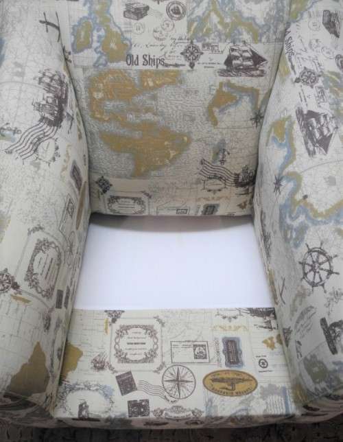 Two stylish & modern arm chairs w/ thick durable fabric w/ a nautical theme.Stunning in all rooms.