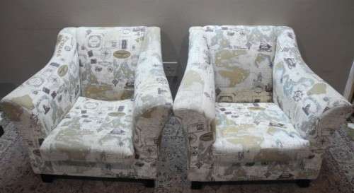 Two stylish & modern arm chairs w/ thick durable fabric w/ a nautical theme.Stunning in all rooms.