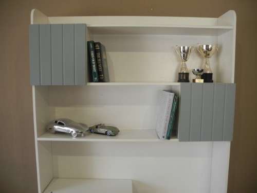 A stylish, modern `Mokki` book case with desk in white and blue.