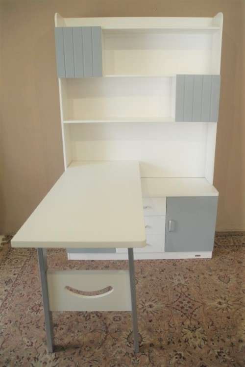 A stylish, modern `Mokki` book case with desk in white and blue.