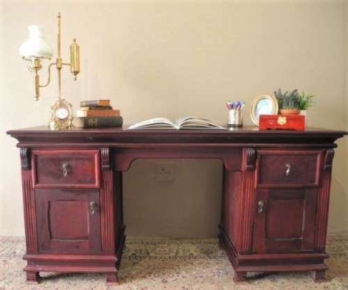 A gorgeous vintage Mahogany two-drawer, two cupboard library/ ladies writing desk w/ ornate handles