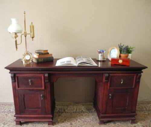 A gorgeous vintage Mahogany two-drawer, two cupboard library/ ladies writing desk w/ ornate handles