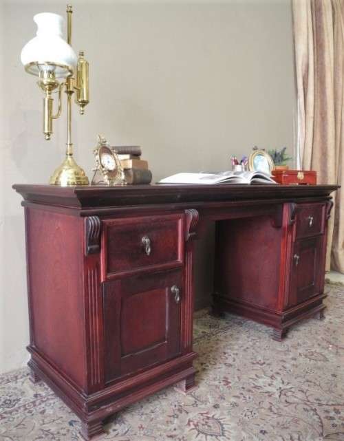 A gorgeous vintage Mahogany two-drawer, two cupboard library/ ladies writing desk w/ ornate handles