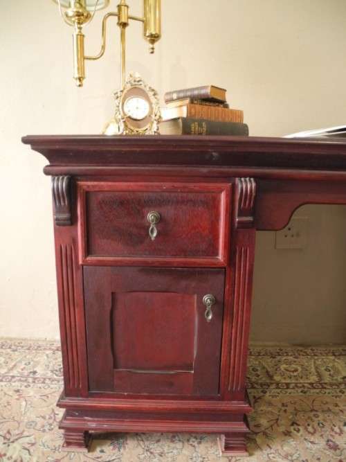 A gorgeous vintage Mahogany two-drawer, two cupboard library/ ladies writing desk w/ ornate handles