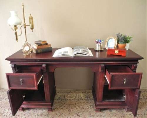 A gorgeous vintage Mahogany two-drawer, two cupboard library/ ladies writing desk w/ ornate handles