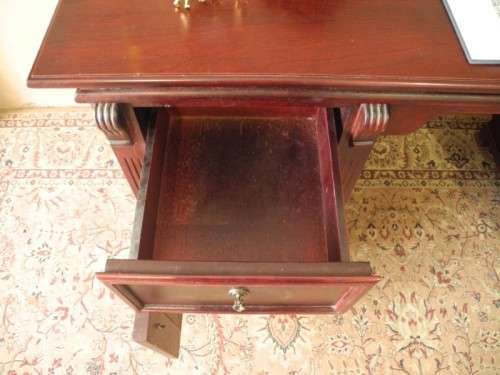 A gorgeous vintage Mahogany two-drawer, two cupboard library/ ladies writing desk w/ ornate handles