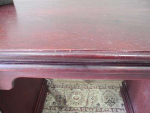 A gorgeous vintage Mahogany two-drawer, two cupboard library/ ladies writing desk w/ ornate handles