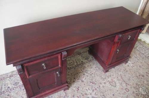 A gorgeous vintage Mahogany two-drawer, two cupboard library/ ladies writing desk w/ ornate handles