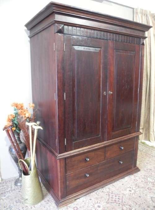 A fantastic large Indonesian Teak Coricraft double door entertainment/ TV unit with three drawers!!