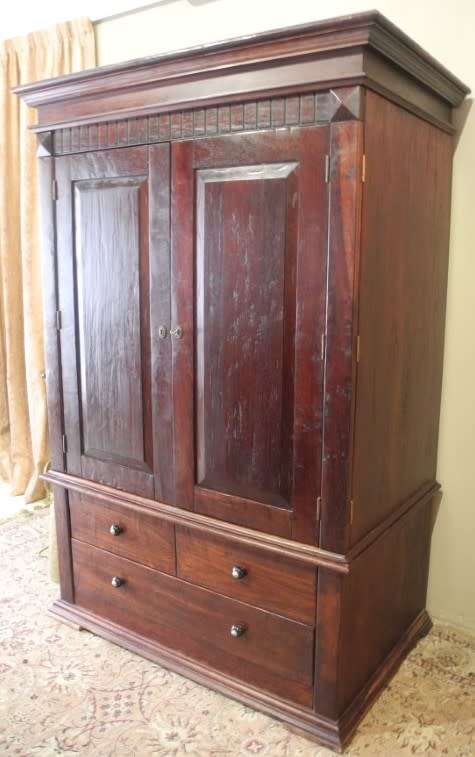 A fantastic large Indonesian Teak Coricraft double door entertainment/ TV unit with three drawers!!