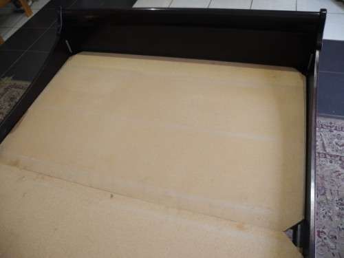 A stylish modern Coricraft Mahogany Queen sleigh bed with an Exotic pillow top mattress