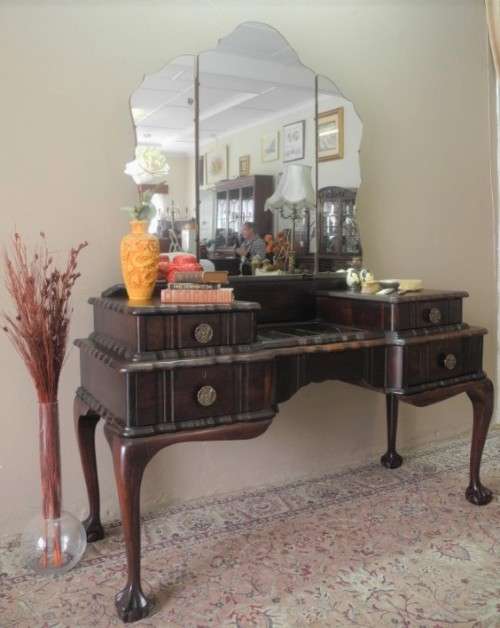 A gorgeous vintage solid Imbuia ball & claw dressing table w 4 drawers, large mirror & brass handles