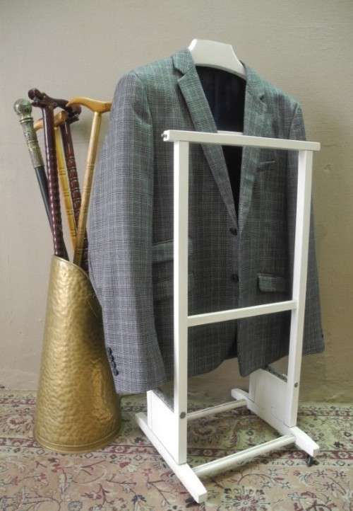 An awesome painted white wooden clothing stand "dumb valet" in good condition.
