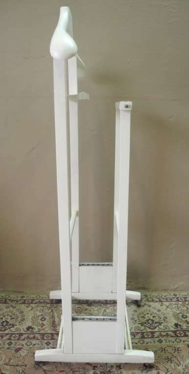 An awesome painted white wooden clothing stand "dumb valet" in good condition.