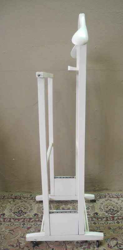 An awesome painted white wooden clothing stand "dumb valet" in good condition.