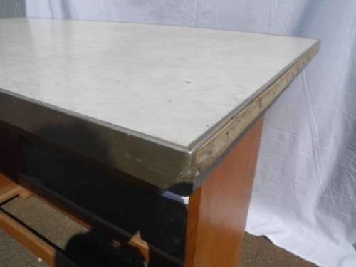 A lovely vintage multi purpose table/desk. Great restoration project!