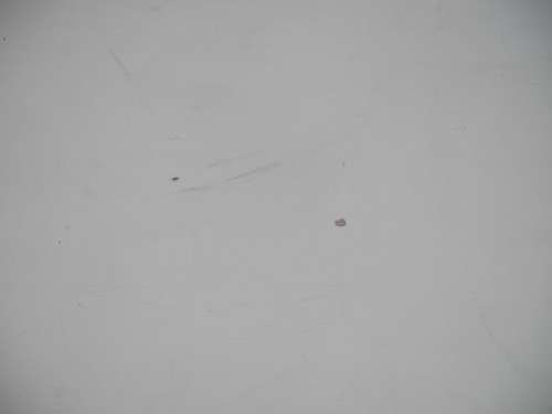 A coffee table for informal living spaces, needs some work or cover.