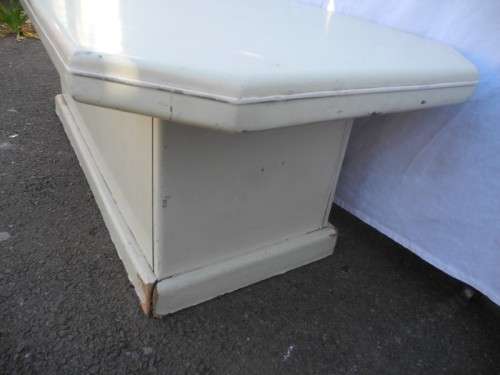 A coffee table for informal living spaces, needs some work or cover.