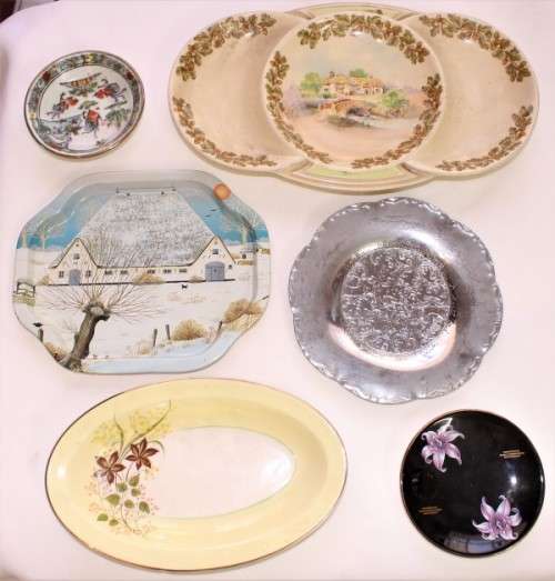 A beautiful collection of 6 plates of different shapes, sizes and designs. perfect wall display!
