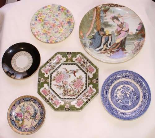 A gorgeous collection of 6 plates of different shapes, sizes and designs. perfect wall display!