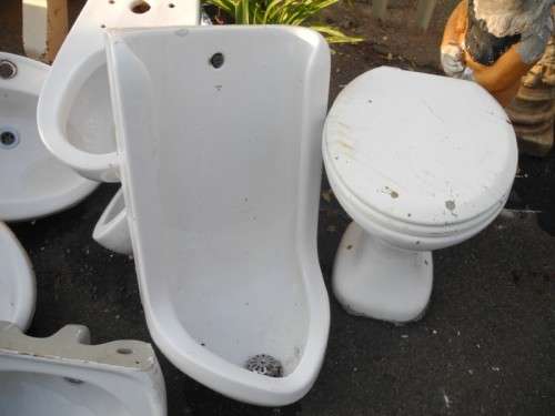 BARGAIN FOR BUILDERS!!!! A 'job lot' of wash basins, toilets and a urinal.
