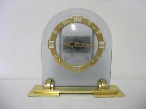 BARGAIN CLOCKS!!A vintage battery operated glass and brass clock. Lifespace Sale