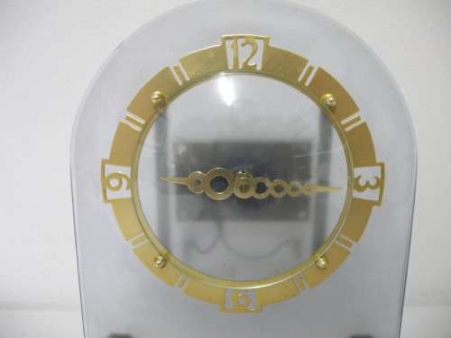 BARGAIN CLOCKS!!A vintage battery operated glass and brass clock. Lifespace Sale