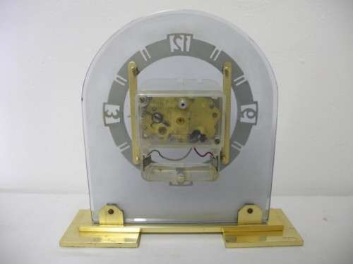 BARGAIN CLOCKS!!A vintage battery operated glass and brass clock. Lifespace Sale