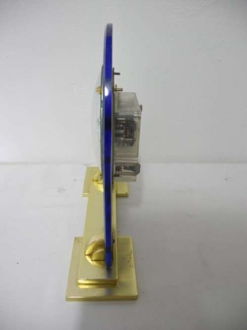 BARGAIN CLOCKS!!A vintage battery operated glass and brass clock. Lifespace Sale