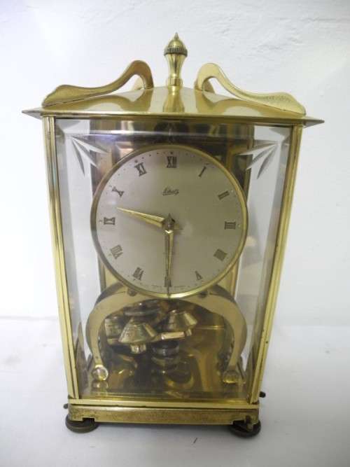 BARGAIN CLOCKS!!A vintage Schatz brass and glass clock. Lifespace Sale