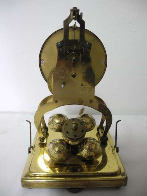 BARGAIN CLOCKS!!A vintage Schatz brass and glass clock. Lifespace Sale
