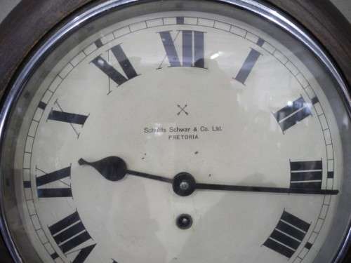 BARGAIN CLOCKS!!A vintage round Schulitis Schwar clock in a wood wall casing. Lifespace Sale