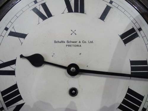 BARGAIN CLOCKS!!A vintage round Schulitis Schwar clock in a wood wall casing. Lifespace Sale