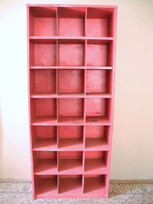 A large red metal cabinet, perfect in a garage, informal living area! Lifespace Sale