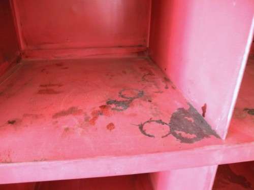 A large red metal cabinet, perfect in a garage, informal living area! Lifespace Sale