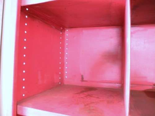 A large red metal cabinet, perfect in a garage, informal living area! Lifespace Sale