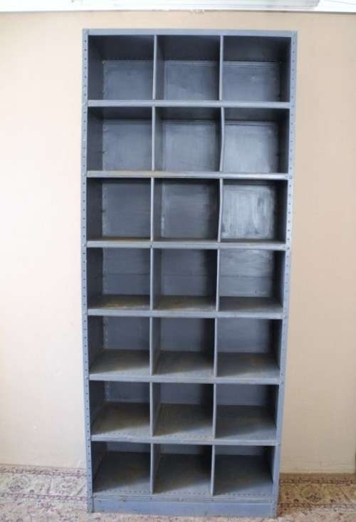 A large grey metal cabinet, perfect in a garage, informal living area! Lifespace Sale
