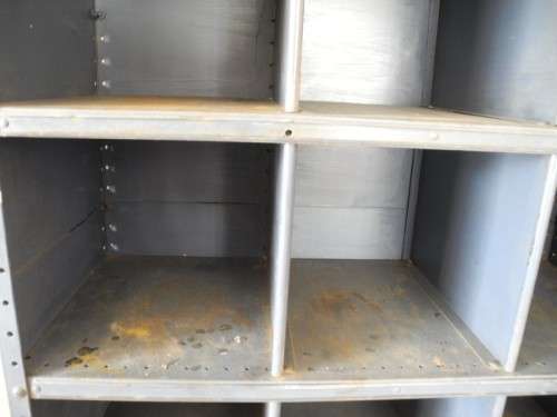 A large grey metal cabinet, perfect in a garage, informal living area! Lifespace Sale