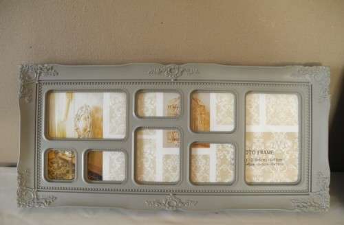 A stunning white and grey plastic wall mounted photo frame for photos. Lifespace Sale